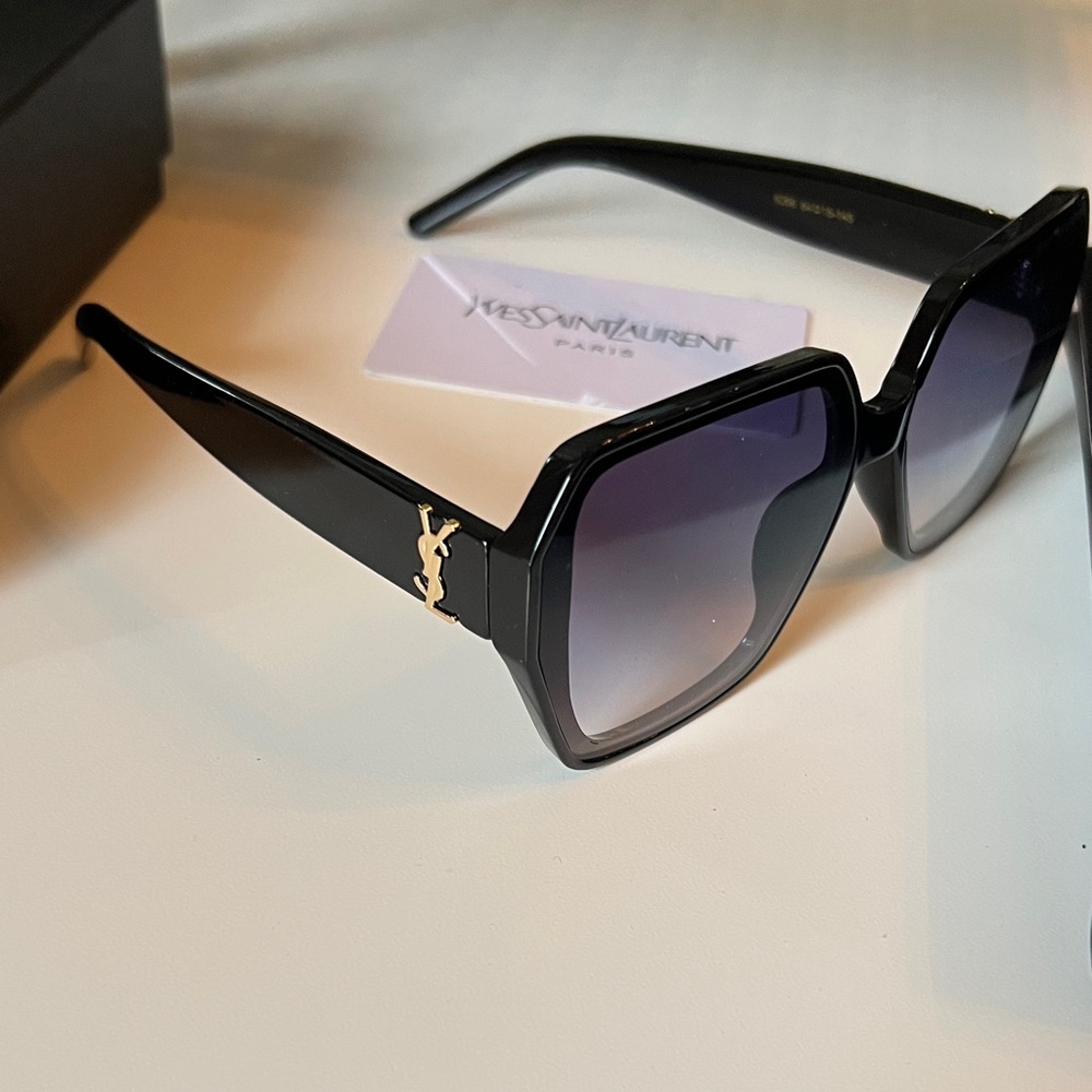 Yves Saint Laurent Black Frame Sunglasses with Gradient Purple Lenses